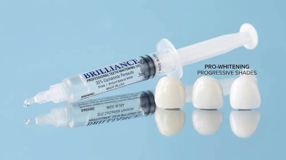Clinical Teeth Whitening and Enamel Stain Removal Professional dental teeth whitening gel syringe and progressive white tooth shades.